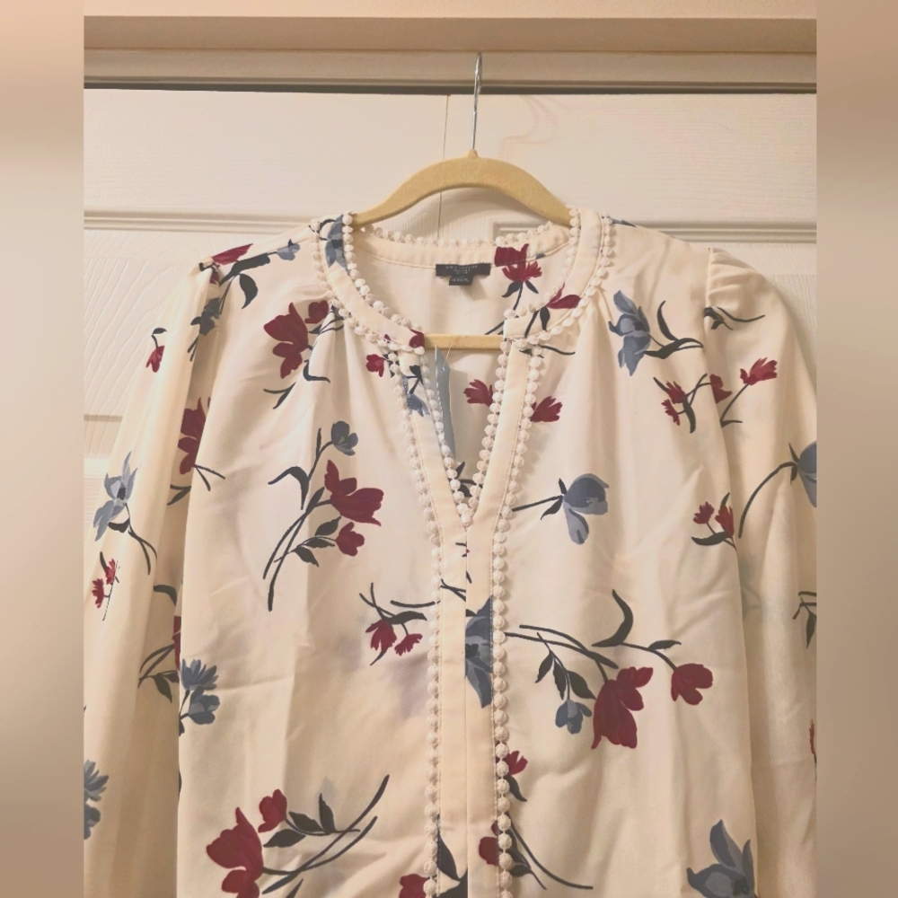 Ann Taylor trendy flowered blouse.